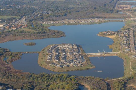 Aerial View of Residential Island and Bridge in Texas Suburb