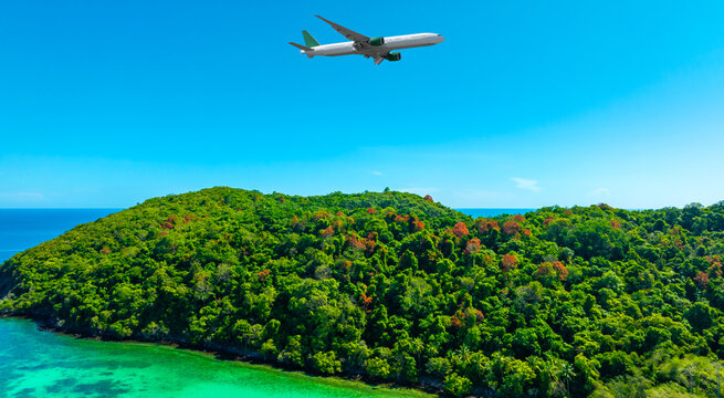 Aerial view of passenger plane and sandy   blue sea  on island with waves at sea beach summer vacation sea travel concept