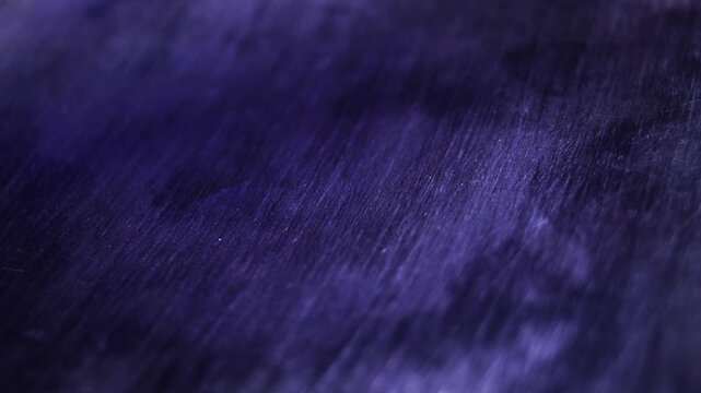 Aluminum texture macro, video loop. Full frame metal surface provides a grunge textured and industrial products background, perfect for design projects seeking a raw and metallic aesthetic