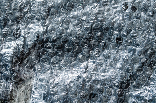 Close-up shot of bubble wrap with clear details showing bubbles and texture