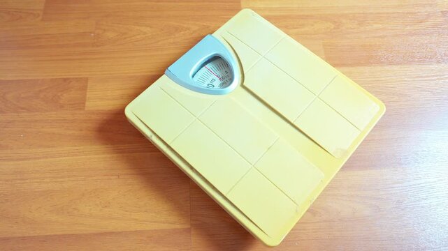 weight scales for measure weight loss.Weighing scale to healthy slimming concept.