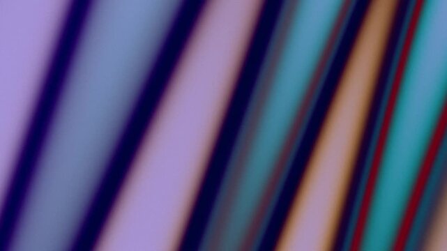 Abstract background with colorful diagonal stripes and soft grain texture