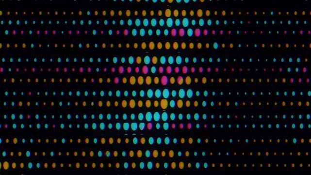 Rows of glowing cyan, orange, and pink dots flicker and shift across a black LED display with scanline distortion