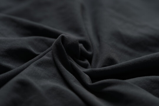 Closeup of dark blue cotton fabric for clothing