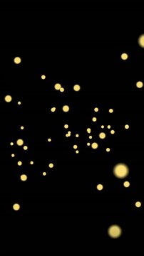 Vertical video: Golden particles rising from lower-left forming and aligning to reveal Bitcoin coin