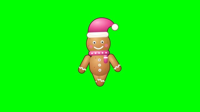 Cute cartoon gingerbread man wearing a pink santa hat and scarf on green backdrop.