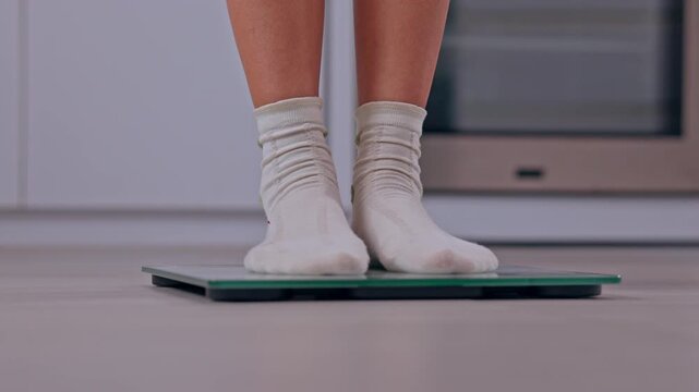 Person Standing in White Socks on Bathroom Weight Scale at Home, Checking Foot Measurement and Balance for Calm, Everyday Health and Wellness Routine