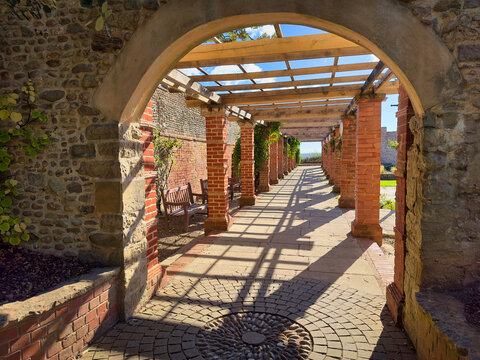 Red Brick Pergola Walkway and Stone Archway in Connaught Gardens, Sidmouth, Devon