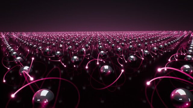 Endless grid of reflective chrome atoms with glowing pink electron rings in a wave motion loop