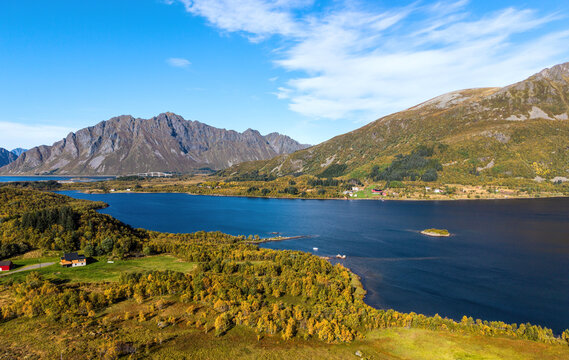 Aerial view of the Lofoten Islands near the E10 with Gimsoystraumen Bridge and autumn scenery