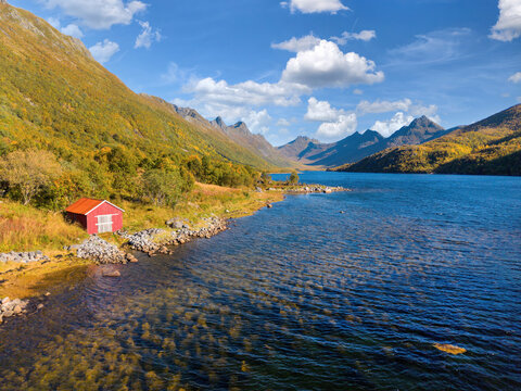Olderfjord surrounded by colorful autumn mountains in the Lofoten Islands