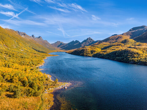 Olderfjord surrounded by colorful autumn mountains in the Lofoten Islands