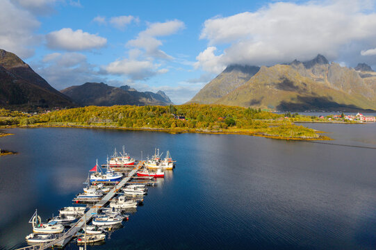 Scenic Lofoten coastal landscape along the E10 between Leknes and Svolvaer with marina and mountains