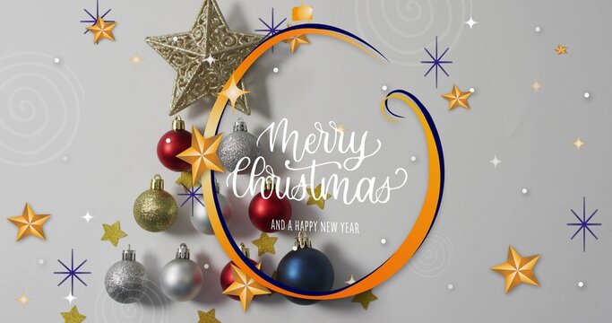 Showing festive holiday design centered on studio backdrop, with circular frame, gold star, baubles