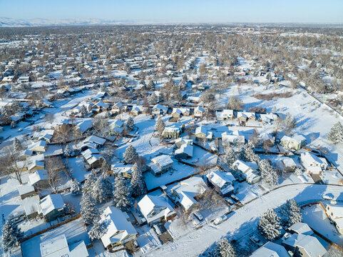 winter morning over city of Fort Collins in northern Colorado after snowstorm, aerial view