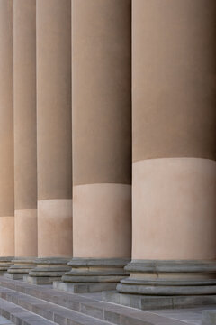 Repeating monumental columns in soft neutral tones
