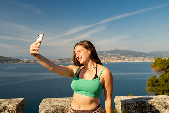 A joyful selfie above the bay in Baiona