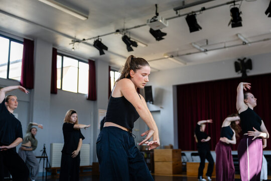 Dance class moment with fluid arm motion