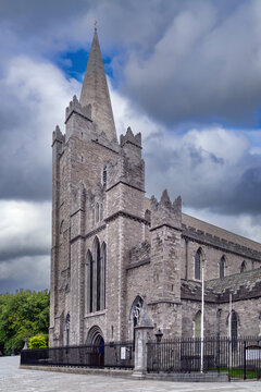 St. Patrick's Cathedral facade in Dublin Ireland. Historic gothic architecture street view under a daytime sky