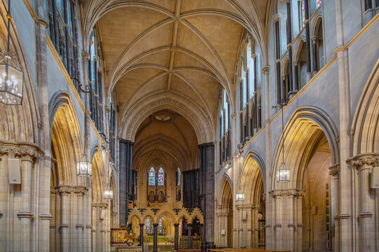 Interior of Christ Church Cathedral in Dublin Ireland. Beautiful empty gothic architecture vault under indoor lighting
