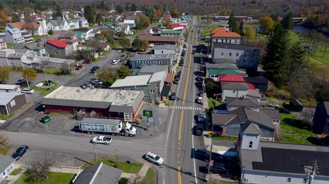 Stunning aerial sights of Davis, West Virginia showcase vibrant autumn foliage over the town and surrounding mountains.