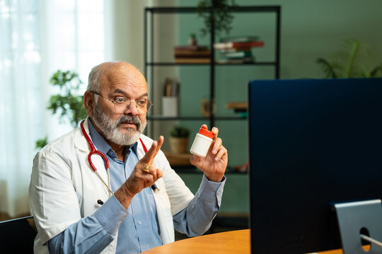 Closeup of Indian Male Doctor Providing Online Medication Guidance