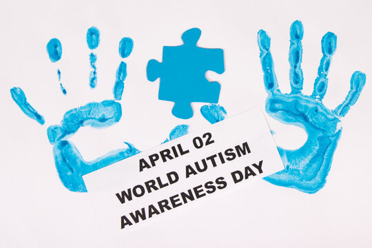 Kid handprint made of paint and inscription April 02 World Autism Awareness Day. Autism Spectrum Disorder