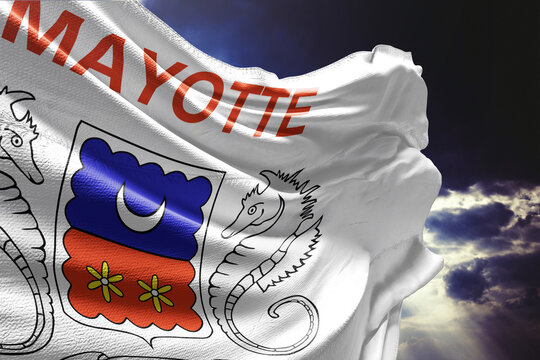 Flag of Mayotte Waving Against Dark Stormy Sky