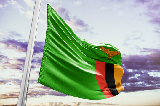 Zambian Flag Waving Against a Cloudy Sky