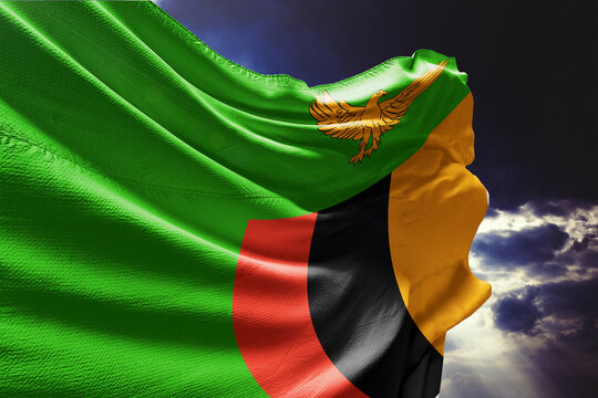 National Flag of Zambia Waving Against a Stormy Sky