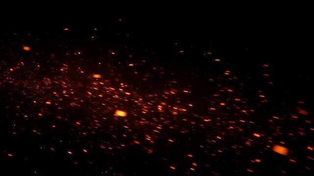 Glowing orange embers drifting across a black background