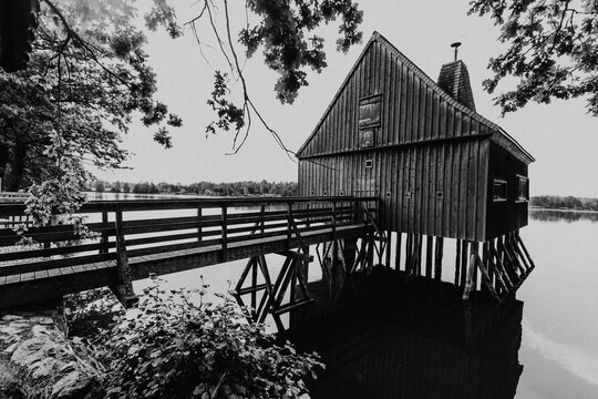 Black and white stilt hut at Plothener Teiche