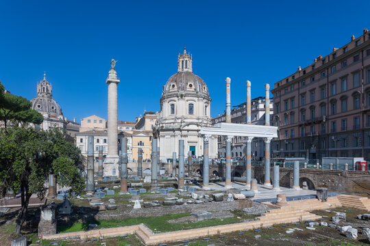 Trajan's Column and Santa Maria di Loreto church dome rising above the ruins of Trajan's Forum in Rome, Italy