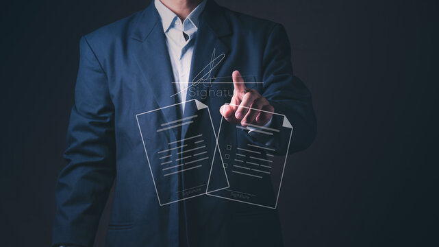 Businessman touches virtual contract papers for electronic signature, digital document management, online legal agreement, paperless office workflow and corporate business partnership