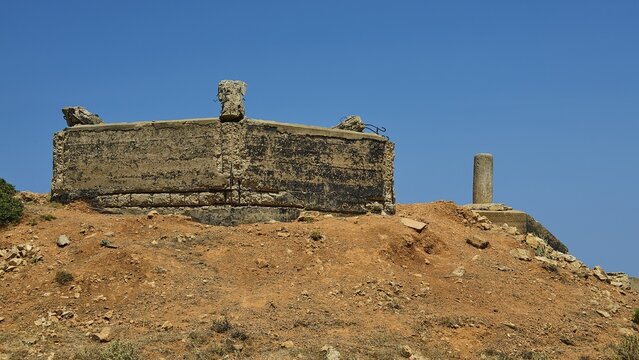 Abandoned concrete structure on a dry hill under a clear sky, Lost Place, Air Defence Position, Aerophone, Parabolic Acoustic Mirror, Patella Mountain, WW2, west of Lakki, Leros, Dodecanese, Greek Islands, Greece