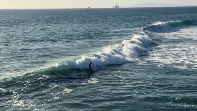 View of Large Ocean Waves at Huntington Beach California in Late Afternoon