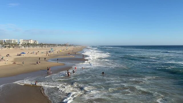View of Large Ocean Waves at Huntington Beach California in Late Afternoon