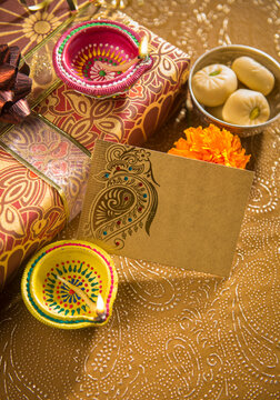 A diwali gift box with an empty tag to write a message on. - Diwali festival gift box - vertical image