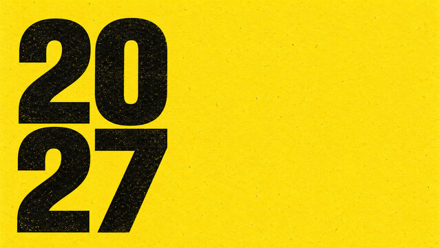 Bold black 2027 typography on bright yellow textured paper background with large stacked numbers and empty copy space, minimalist New Year 2027 graphic design and modern poster