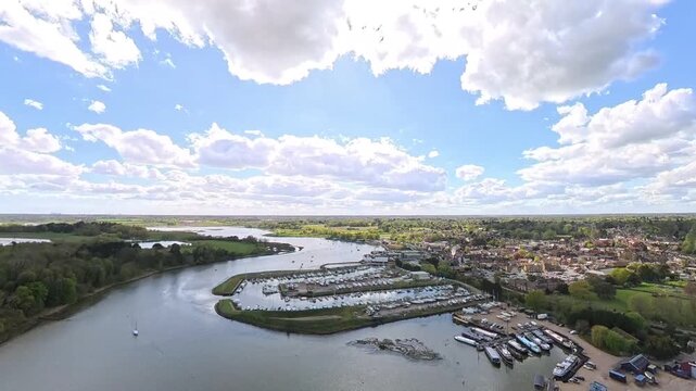 Travel and History: 4K Drone Aerial View of River Deben Estuary and Waterfront Countryside near Woodbridge Suffolk UK