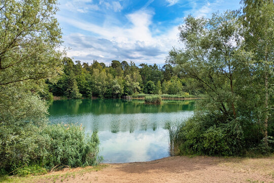 Walldorf, Germany - July 5th 2026: View of Hochholzer See Waldsee