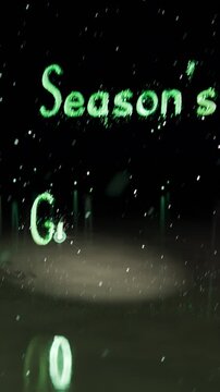 Vertical video: Drifting particles forming neon green Season's Greetings at center to show greeting