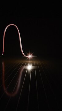 Vertical video: Streak sparking sparkler tracing red loops on ribbed floor, centering burst in ring