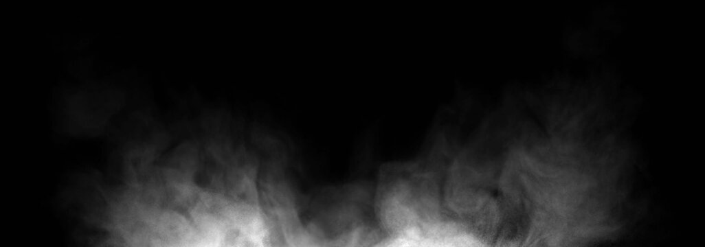 Dynamic explosion of white powder and dust particles surging upward from the bottom on a black background. Concept of abstract energy burst, special effect overlay, and dramatic mist texture.