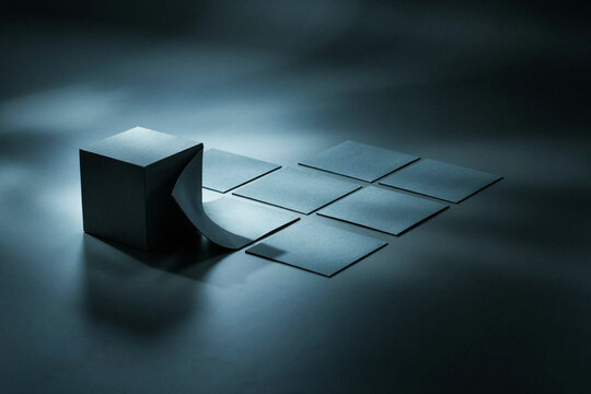 Dark cube opening onto its flattened net