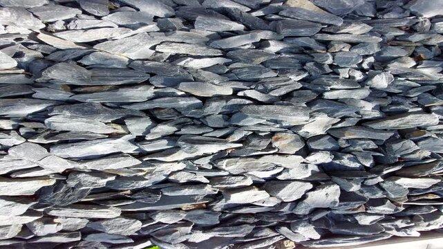 dark grey slate chippings and crushed stone gravel surface