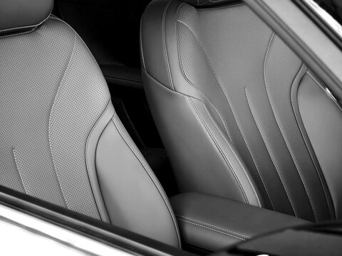 Front car interior with gray perforated leather seats