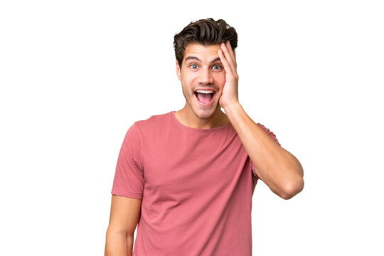 Young handsome caucasian man over isolated background with surprise and shocked facial expression