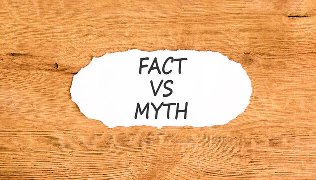 Fact vs versus myth words symbol. Concept words Fact vs Myth on beautiful white paper. Beautiful wooden background. Business and fact vs versus myth concept. Copy space.