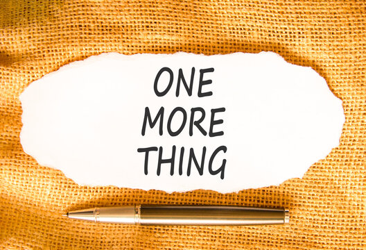 One more thing words symbol. Concept words One more thing on beautiful white paper. Beautiful canvas background. Black pen. Business and one more thing concept. Copy space.